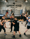 Boxers training during group boxing classes at Supreme Boxer Boxing Club near Wildomar, CA